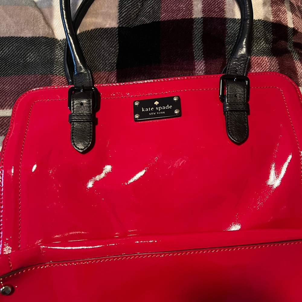 Kate Spade red & black patent bag. Clean inside and out carried once.